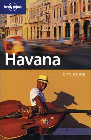 
Havana street scene, musician carrying stand up bass - Havana (Lonely Planet)
